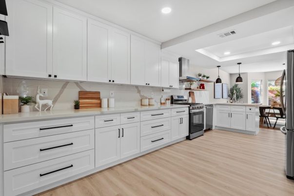 Dining room, Interior, Kitchen, Pendant Lights, Recessed Lighting, Stainless Steel Appliances, Wood Texture Flooring