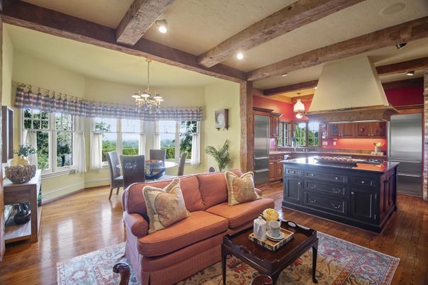 Chandelier, Dining room, Interior, Kitchen, Living room, Pendant Lights, Recessed Lighting, Stainless Steel Appliances, Wooden Beams, Wood Texture Flooring