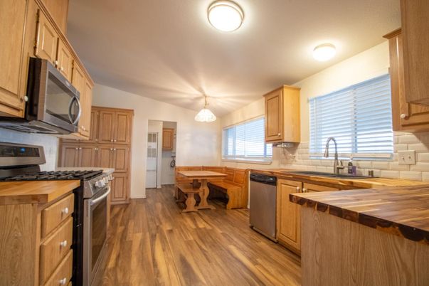 Chandelier, Interior, Kitchen, Stainless Steel Appliances, Wood Texture Flooring