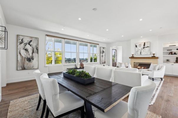Dining room, Fireplace, Interior, Living room, Recessed Lighting, Wood Texture Flooring