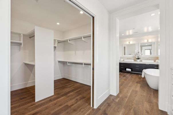 Bathroom, Dual Sink Vanities, Free Standing Baths, Interior, Recessed Lighting, Walk-in Closets, Wood Texture Flooring