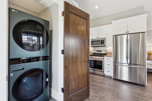 Interior, Kitchen, Recessed Lighting, Stainless Steel Appliances, Utility Closets, Washer, Wood Texture Flooring