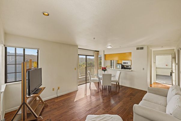 Dining room, Interior, Kitchen, Recessed Lighting, Stainless Steel Appliances, Wood Texture Flooring
