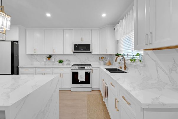 Interior, Kitchen, Marble Walls, Recessed Lighting, Stainless Steel Appliances, Wood Texture Flooring