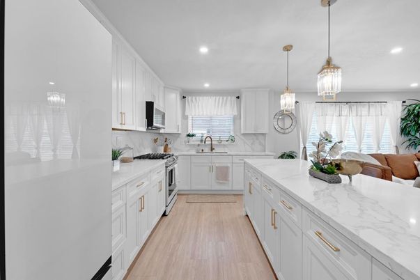 Interior, Kitchen, Marble Walls, Pendant Lights, Recessed Lighting, Wood Texture Flooring