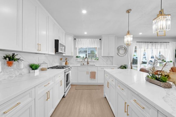 Interior, Kitchen, Marble Walls, Pendant Lights, Recessed Lighting, Stainless Steel Appliances, Wood Texture Flooring
