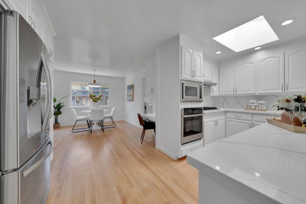Dining room, Interior, Kitchen, Pendant Lights, Recessed Lighting, Stainless Steel Appliances, Wood Texture Flooring