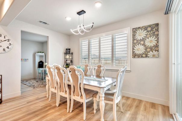 Dining room, Fireplace, Interior, Pendant Lights, Recessed Lighting, Wood Texture Flooring