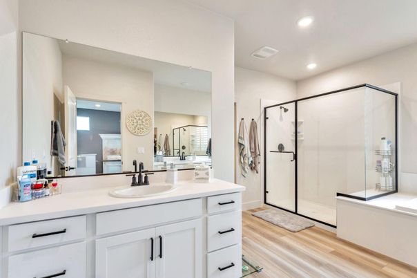 Bathroom, Dual Sink Vanities, Glass Shower, Interior, Recessed Lighting, Wood Texture Flooring
