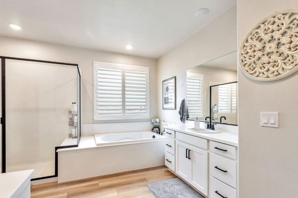 Bathroom, Dual Sink Vanities, Interior, Recessed Lighting, Wood Texture Flooring