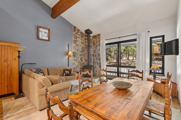 Dining room, Fireplace, Interior, Living room, Stone Walls, Wooden Beams, Wood Texture Flooring