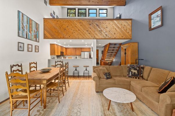 Dining room, Interior, Kitchen, Living room, Recessed Lighting, Stainless Steel Appliances, Wooden Beams, Wood Texture Flooring