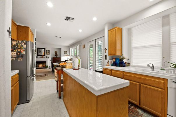 Fireplace, Interior, Kitchen, Recessed Lighting, Tile Countertops