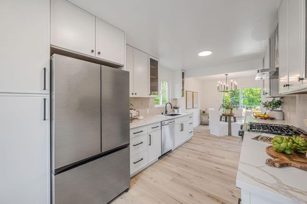 Chandelier, Dining room, Interior, Kitchen, Recessed Lighting, Stainless Steel Appliances, Wood Texture Flooring