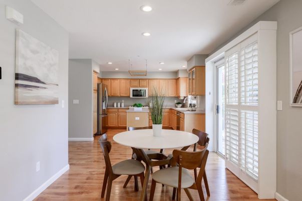 Dining room, Interior, Kitchen, Recessed Lighting, Stainless Steel Appliances, Wood Texture Flooring