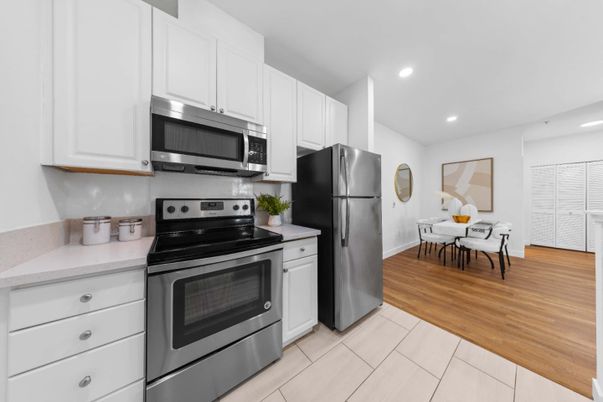 Dining room, Interior, Kitchen, Recessed Lighting, Stainless Steel Appliances, Wood Texture Flooring