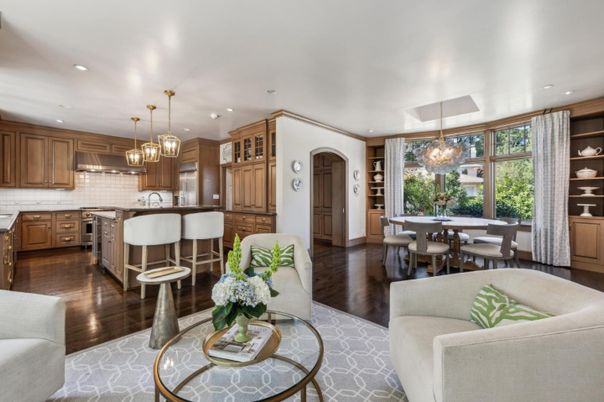 Chandelier, Dining room, Interior, Kitchen, Living room, Pendant Lights, Recessed Lighting, Stainless Steel Appliances, Wood Texture Flooring