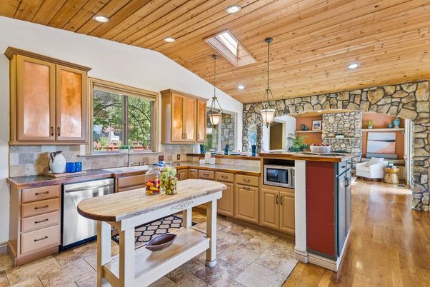 Interior, Kitchen, Pendant Lights, Recessed Lighting, Stainless Steel Appliances, Stone Walls, Wooden Ceilings, Wood Texture Flooring