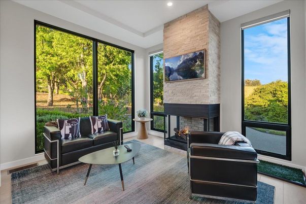 Fireplace, Interior, Living room, Recessed Lighting, Stone Walls, Wood Texture Flooring