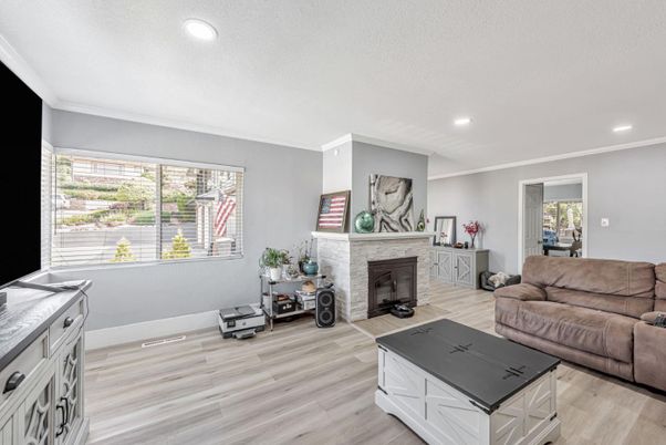 Fireplace, Interior, Living room, Recessed Lighting, Wood Texture Flooring