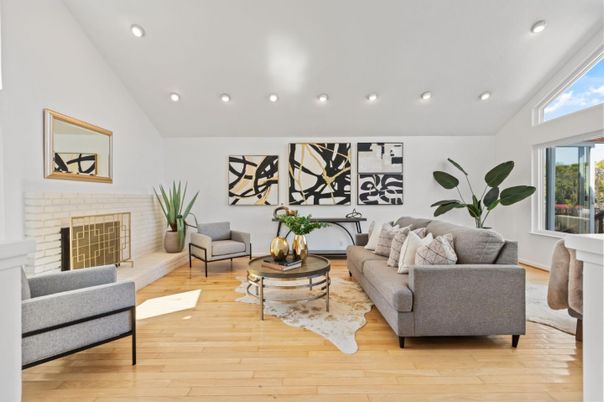 Fireplace, Interior, Living room, Recessed Lighting, Stone Walls, Wood Texture Flooring