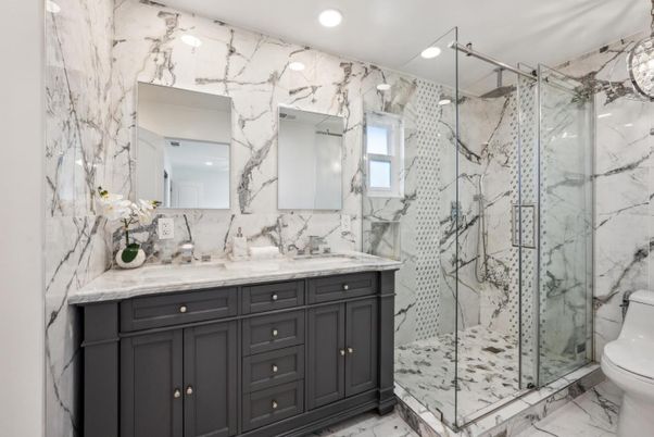 Bathroom, Dual Sink Vanities, Glass Shower, Interior, Marble, Marble Walls, Recessed Lighting