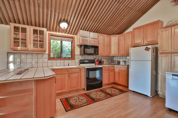 Interior, Kitchen, Tile Countertops, Wood Texture Flooring