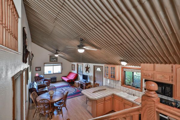 Dining room, Interior, Kitchen, Living room, Tile Countertops, Wood Texture Flooring