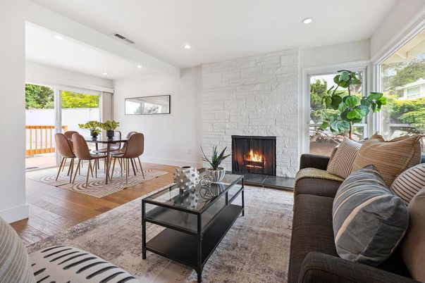 Dining room, Fireplace, Interior, Living room, Recessed Lighting, Stone Walls, Wood Texture Flooring