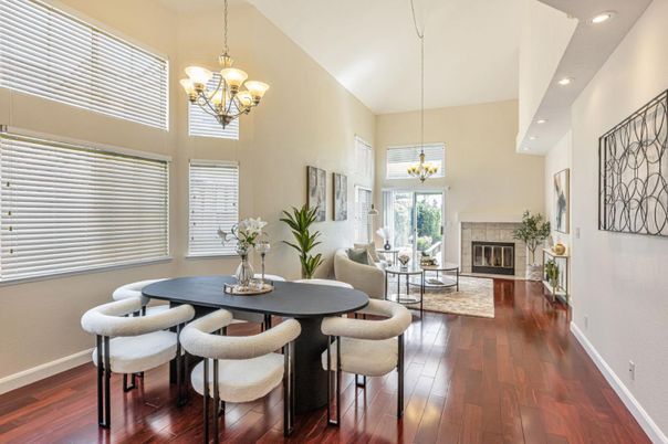 Chandelier, Dining room, Fireplace, Interior, Living room, Pendant Lights, Recessed Lighting, Wood Texture Flooring