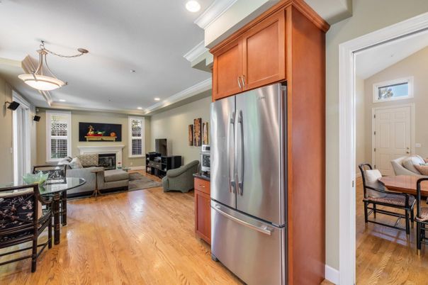 Dining room, Fireplace, Interior, Kitchen, Living room, Pendant Lights, Recessed Lighting, Stainless Steel Appliances, Wood Texture Flooring