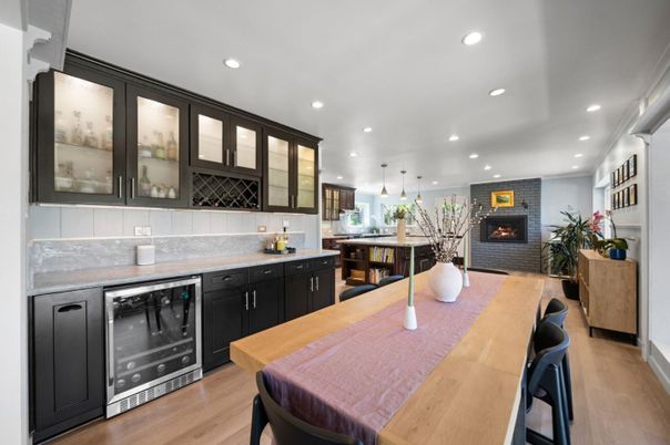 Fireplace, Interior, Kitchen, Pendant Lights, Recessed Lighting, Stainless Steel Appliances, Stone Walls, Wood Texture Flooring