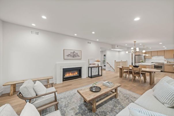 Dining room, Fireplace, Interior, Kitchen, Living room, Pendant Lights, Recessed Lighting, Stainless Steel Appliances, Wood Texture Flooring