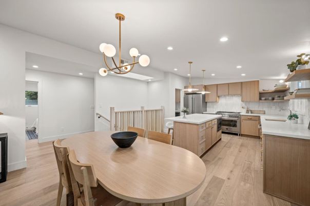 Dining room, Interior, Kitchen, Pendant Lights, Recessed Lighting, Stainless Steel Appliances, Wood Texture Flooring