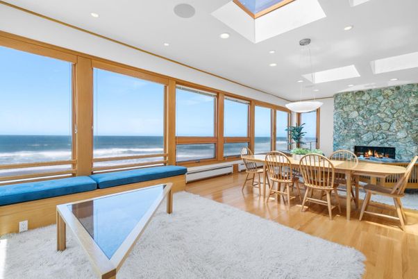 Dining room, Fireplace, Interior, Pendant Lights, Recessed Lighting, Stone Walls, Water, Wood Texture Flooring