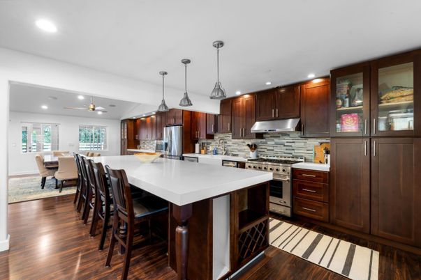 Dining room, Interior, Kitchen, Pendant Lights, Recessed Lighting, Stainless Steel Appliances, Wood Texture Flooring