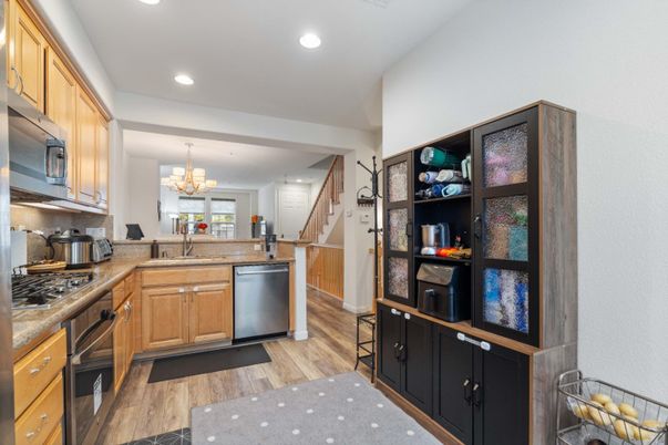 Chandelier, Interior, Kitchen, Recessed Lighting, Stainless Steel Appliances, Wood Texture Flooring