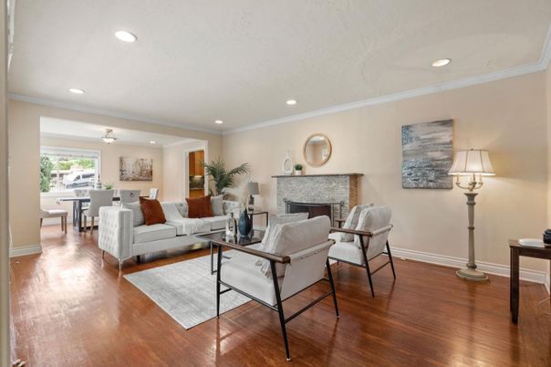 Dining room, Fireplace, Interior, Living room, Recessed Lighting, Wood Texture Flooring