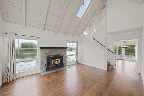 Empty room, Fireplace, Interior, Pendant Lights, Wooden Beams, Wooden Ceilings, Wood Texture Flooring