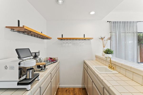 Interior, Kitchen, Recessed Lighting, Tile Countertops, Wood Texture Flooring