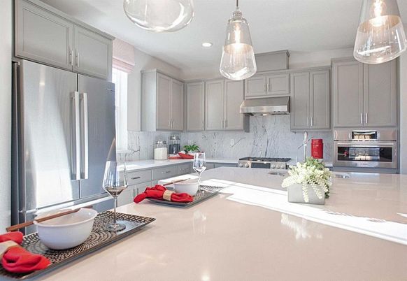Interior, Kitchen, Marble Walls, Pendant Lights, Recessed Lighting, Stainless Steel Appliances