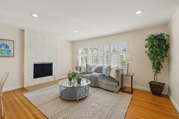 Fireplace, Interior, Living room, Recessed Lighting, Stone Walls, Wood Texture Flooring