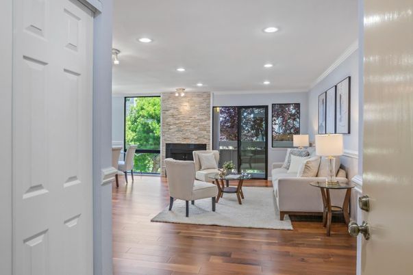 Fireplace, Interior, Living room, Recessed Lighting, Stone Walls, Wood Texture Flooring