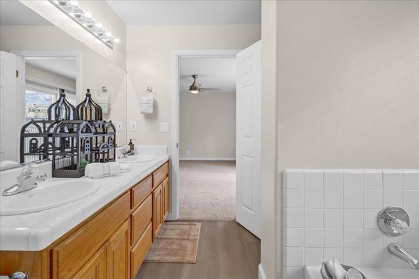 Bathroom, Dual Sink Vanities, Interior, Tile Countertops, Wood Texture Flooring