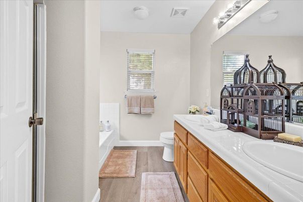 Bathroom, Dual Sink Vanities, Interior, Tile Countertops, Wood Texture Flooring