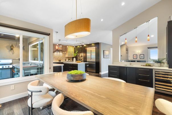 Dining room, Interior, Kitchen, Pendant Lights, Recessed Lighting, Stainless Steel Appliances, Wood Texture Flooring