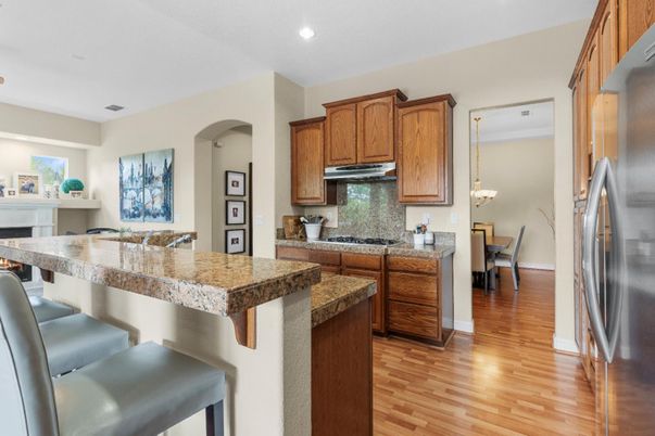 Chandelier, Dining room, Fireplace, Interior, Kitchen, Pendant Lights, Recessed Lighting, Wood Texture Flooring