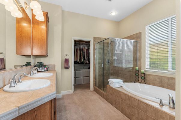 Bathroom, Dual Sink Vanities, Glass Shower, Interior, Recessed Lighting, Tile Countertops