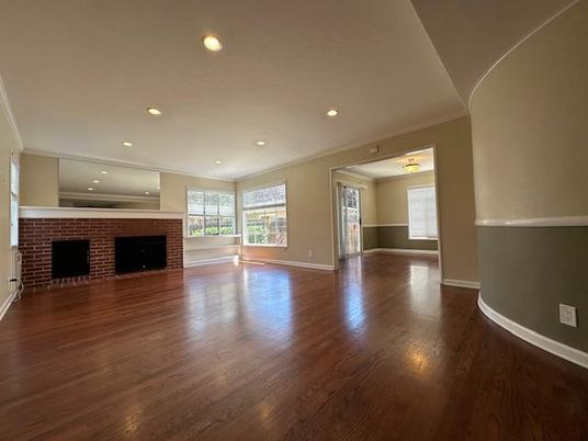 Empty room, Fireplace, Interior, Recessed Lighting, Stone Walls, Wood Texture Flooring