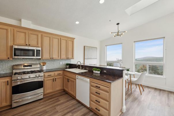 Dining room, Interior, Kitchen, Pendant Lights, Recessed Lighting, Stainless Steel Appliances, Wood Texture Flooring